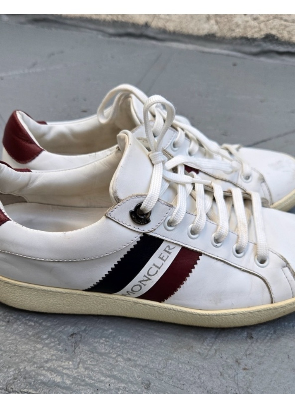Moncler Womens White Leather Sneakers with Red and Black Stripes